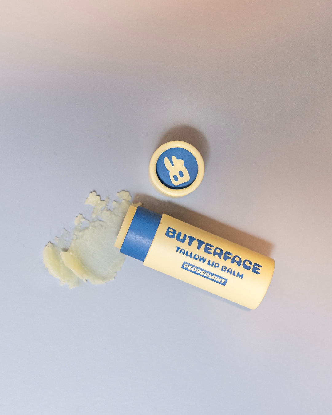 tallow butter lip balm named butterface texture shot